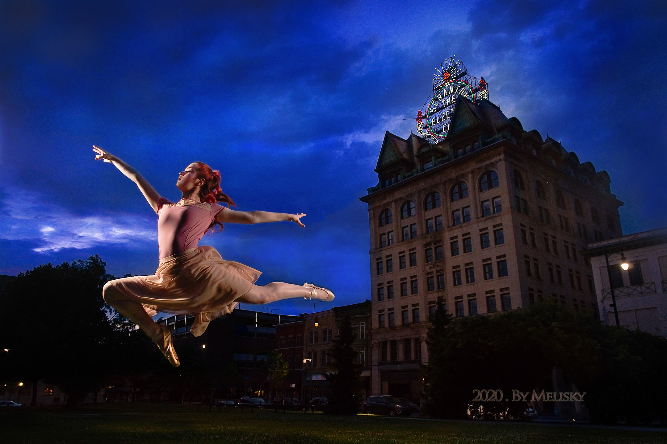 Dancer Leaps on Electric City Lawn