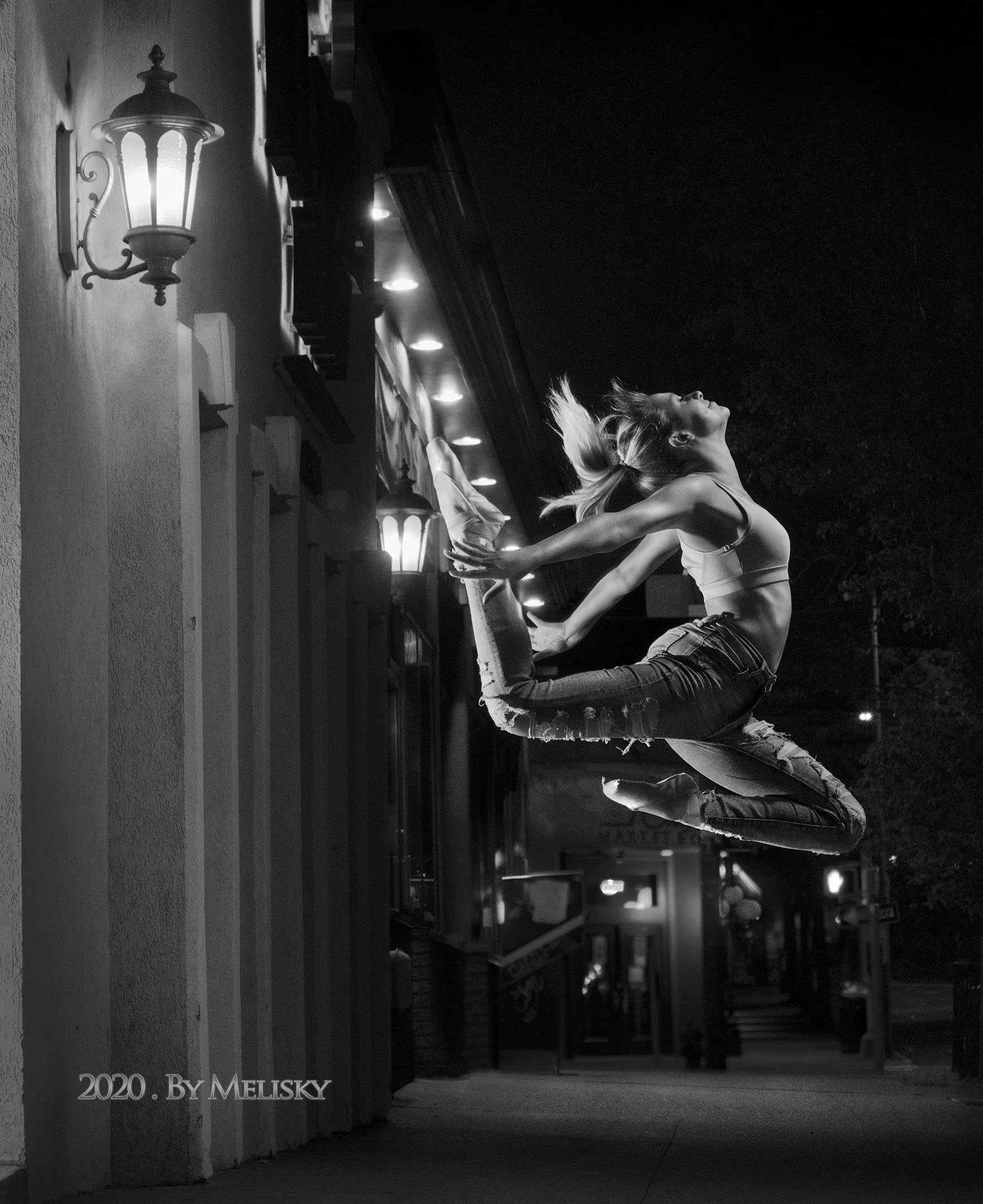 Dancer leaping on a Scranton Street