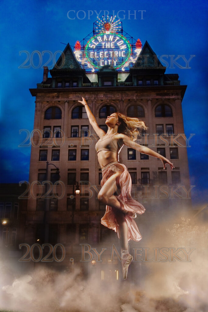 Dancer leaping at Electric Building